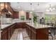 Spacious kitchen boasting stainless steel appliances, granite countertops, and an island with seating at 4815 Edgemoore Trce, Cumming, GA 30040