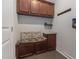 Functional mudroom with built-in storage, coat hooks, and seating at 4815 Edgemoore Trce, Cumming, GA 30040