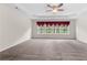 Spacious main bedroom features neutral paint and plush carpet, ready for personalization at 5312 Tormeal Trce, Suwanee, GA 30024
