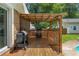 Inviting back deck featuring a grill and convenient access to outdoor enjoyment and relaxation at 5401 Rosser Rd, Tucker, GA 30087