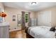 This bedroom has hardwood floors, a closet and a dresser at 5401 Rosser Rd, Tucker, GA 30087