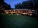 Charming brick home with manicured front lawn and a welcoming porch, perfect for relaxing evenings at 5401 Rosser Rd, Tucker, GA 30087