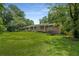 Charming home with a well-manicured lawn, inviting porch, and mature trees offering shade and curb appeal at 5401 Rosser Rd, Tucker, GA 30087