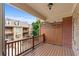 A spacious balcony with wood floors and a view of the surrounding neighborhood at 611 Parkside Village Nw Way, Marietta, GA 30060