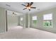 Spacious bedroom featuring a ceiling fan, neutral paint, and plenty of natural light at 611 Parkside Village Nw Way, Marietta, GA 30060