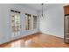 Bright dining area with hardwood floors, windows and a glass door to a patio at 611 Parkside Village Nw Way, Marietta, GA 30060