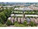 An aerial view of a neighborhood showing the city skyline, houses, and tree-lined streets at 1220 State Nw St, Atlanta, GA 30318