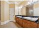 Bathroom with double vanity, granite countertop, and a large mirror at 1220 State Nw St, Atlanta, GA 30318