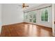 Bedroom featuring hardwood floors, large windows and a balcony access at 1220 State Nw St, Atlanta, GA 30318