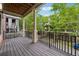 Inviting outdoor deck with black iron railing and neighborhood views at 1220 State Nw St, Atlanta, GA 30318