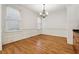 Bright dining area with hardwood floors, chandelier, and classic moldings at 1220 State Nw St, Atlanta, GA 30318