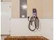 Garage wall with electric vehicle charging station and circuit breaker at 1220 State Nw St, Atlanta, GA 30318