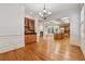 Open-concept design with kitchen featuring an island, stainless steel appliances and a wet bar at 1220 State Nw St, Atlanta, GA 30318