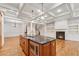 Modern kitchen with granite countertops, wooden cabinets, an island and stainless steel appliances at 1220 State Nw St, Atlanta, GA 30318