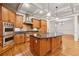 Gourmet kitchen featuring stainless steel appliances and a large center island at 1220 State Nw St, Atlanta, GA 30318