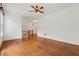Living room features hardwood floors, bright, airy space with staircase at 1220 State Nw St, Atlanta, GA 30318