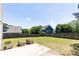 Expansive backyard featuring a well-maintained lawn and a sturdy wooden privacy fence at 2167 Tilson Rd, Decatur, GA 30032