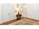 Bedroom with hardwood floors, closet, and vintage sewing machine as decor at 2167 Tilson Rd, Decatur, GA 30032