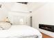 Bedroom with a modern fireplace and large window, offering a bright and relaxing atmosphere at 2167 Tilson Rd, Decatur, GA 30032