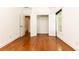 Empty bedroom with hardwood floors, closet, and natural light from the window at 2167 Tilson Rd, Decatur, GA 30032