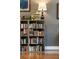 Cozy reading nook featuring a full bookshelf with charming decor and a decorative lamp at 2167 Tilson Rd, Decatur, GA 30032