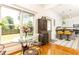 Bright breakfast nook with stylish decor, a view to the yard, and an open kitchen concept at 2167 Tilson Rd, Decatur, GA 30032