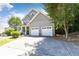 Charming home showcasing a two-car garage and a well-maintained driveway at 2167 Tilson Rd, Decatur, GA 30032