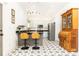 Modern kitchen with white cabinetry, stainless steel appliances, and bar seating at 2167 Tilson Rd, Decatur, GA 30032
