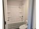 Clean bathroom with tub and shower, along with a toilet at 246 Crabapple Rd, Mcdonough, GA 30253