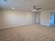 Spacious bedroom with a ceiling fan and access to other rooms at 246 Crabapple Rd, Mcdonough, GA 30253