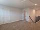 Cozy bedroom with carpeting and an access to stairs and other rooms at 246 Crabapple Rd, Mcdonough, GA 30253
