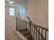 Second story hallway with natural lighting at 246 Crabapple Rd, Mcdonough, GA 30253