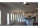 Bright living room featuring an island, stainless steel appliances, and open concept design at 246 Crabapple Rd, Mcdonough, GA 30253