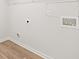 Unfinished basement wall with light vinyl flooring at 3036 Manor Hill Pl, Union City, GA 30291