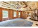Unfinished basement space with exposed ceiling and natural light from several windows at 3930 Suwanee Bend Dr, Suwanee, GA 30024