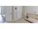Bedroom with crib and neutral carpet at 3930 Suwanee Bend Dr, Suwanee, GA 30024