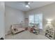 Bedroom with crib, changing table, neutral walls, and window at 3930 Suwanee Bend Dr, Suwanee, GA 30024