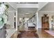 Inviting foyer with hardwood floors, staircase, and elegant decor at 3930 Suwanee Bend Dr, Suwanee, GA 30024