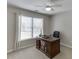 Office with a desk, chair, large window, and neutral carpet at 3930 Suwanee Bend Dr, Suwanee, GA 30024
