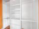 Well-organized closet with built in shelving and drawers, perfect for maximizing storage at 4624 Park Dr, Pine Lake, GA 30072