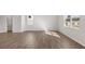 Sunlit living room with modern flooring, fresh paint, and bright, airy feel at 6131 Knickerbocker St, Mableton, GA 30126