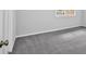 Empty bedroom with neutral paint and carpet with natural light at 6520 Roswell Rd # 48, Atlanta, GA 30328