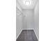 Walk-in closet with shelves and metal clothes hanger at 6520 Roswell Rd # 48, Atlanta, GA 30328