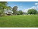 A generous, verdant lawn offers ample space for outdoor activities and enjoyment at 1915 North Rd, Snellville, GA 30078