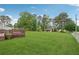 Expansive backyard with a deck and lush lawn at 1915 North Rd, Snellville, GA 30078