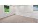 This basement has a window and access to the exterior of the home at 1915 North Rd, Snellville, GA 30078