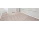 Spacious basement features neutral carpet and white painted walls at 1915 North Rd, Snellville, GA 30078