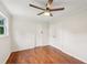 This bedroom has a ceiling fan, natural light, and beautiful wood flooring at 1915 North Rd, Snellville, GA 30078