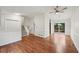 Dining room featuring hardwood floors, access to a deck, and contemporary lighting at 1915 North Rd, Snellville, GA 30078