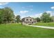 Charming home with a large front lawn and driveway at 1915 North Rd, Snellville, GA 30078
